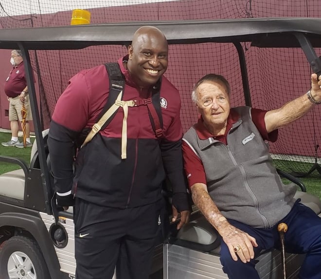 Carlos Locklyn (left) poses for a photo with legendary FSU head football coach Bobby Bowden during an early practice in 2020.