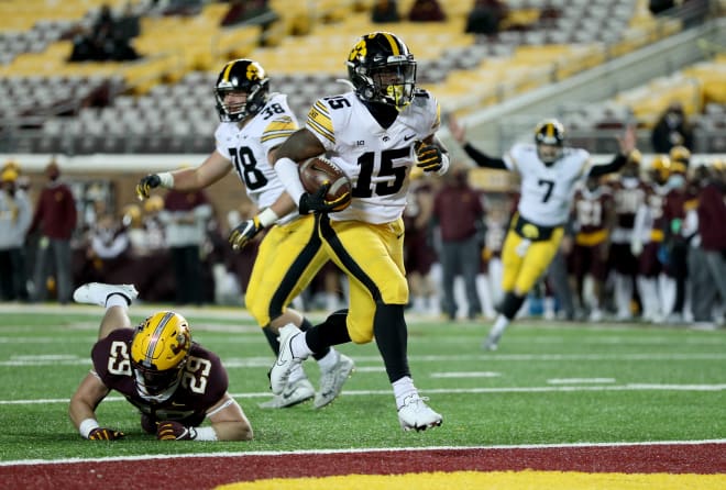 Tyler Goodson looks to run past the Gophers. (Photo: Hawkeyesports.com)