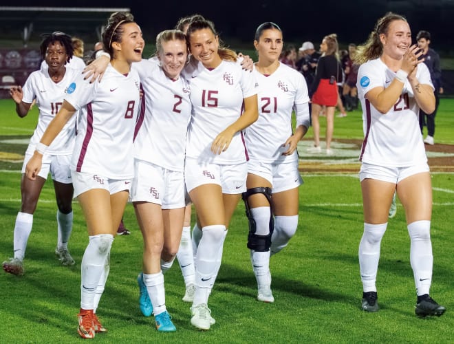 The FSU soccer team celebrates its win over Arkansas to clinch a spot in the College Cup.