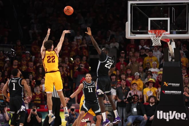 Iowa State guard Gabe Kalscheur (22) shoots over Kansas State center Abayomi Iyiola during the Wildcats' 80-76 loss to the Cyclones.
