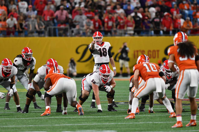 Georgia quarterback JT Daniels (18), Georgia offensive lineman Warren Ericson (50) during the Duke’s Mayo Classic against Clemson at Bank of America Stadium in Charlotte, NC, on Saturday, Sept. 4, 2021. (photo by Rob Davis/UGA Sports Communications)