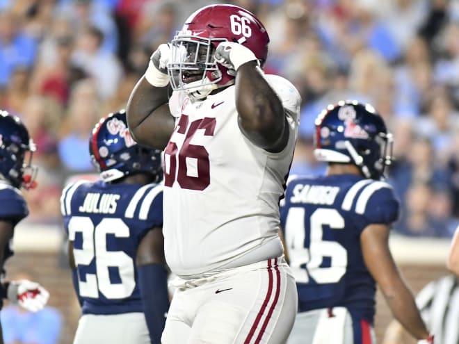 Alabama offensive lineman Kendall Randolph celebrates during the Crimson Tide's 62-7 win at Ole Miss Saturday.