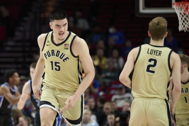 Nov 27, 2022; Portland, Oregon, USA; Purdue Boilermakers center Zach Edey (15) celebrates during the second half after scoring a basket against the Duke Blue Devils at Moda Center. Purdue won the Phil Knight Legacy Championship game 75-56. Mandatory Credit: Troy Wayrynen-USA TODAY Sports