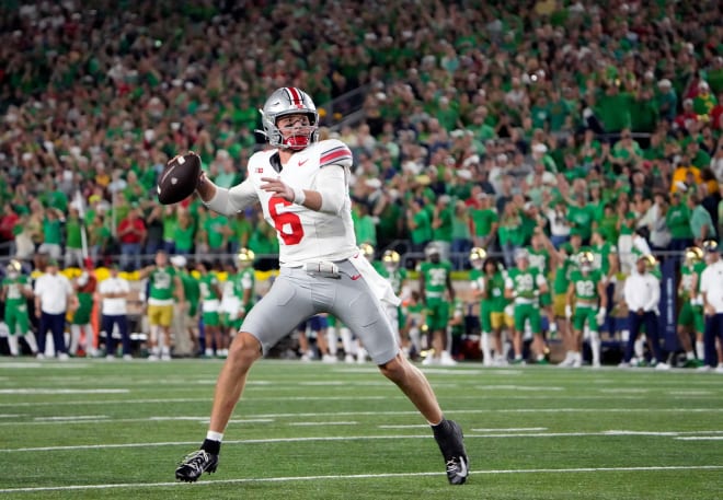 Ohio State quarterback Kyle McCord (No. 6) attempts a pass during the Buckeyes' win at Notre Dame. 