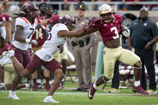 Trey Benson uses motivation from mom, Dalvin Cook for career rushing day -  TheOsceola