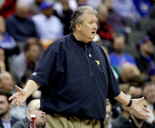 West Virginia Mountaineers basketball head coach Bob Huggins wants to see better passing. 