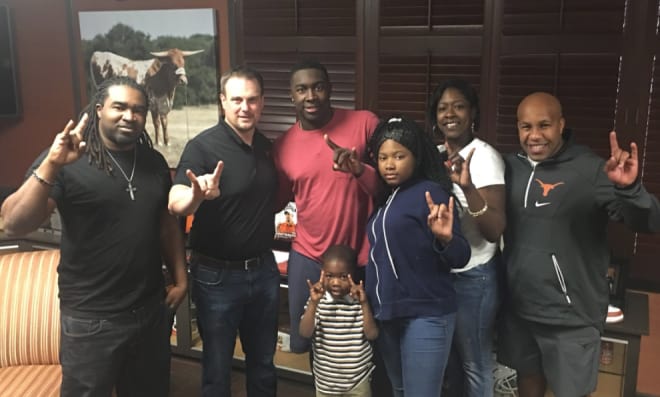 Mike Williams (center) committed to Texas on Monday, one day after finishing up his UT official visit. 