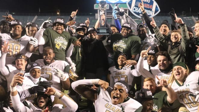 UAB players celebrate their Conference USA Championship.