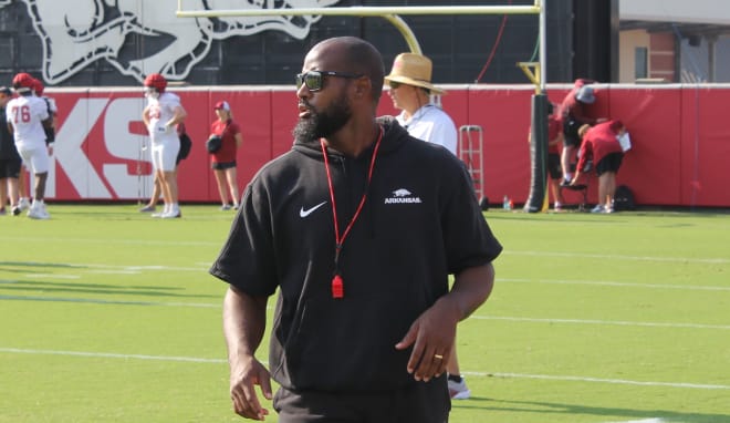 Arkansas RBs coach Kolby Smith at Friday's practice in Fayetteville.