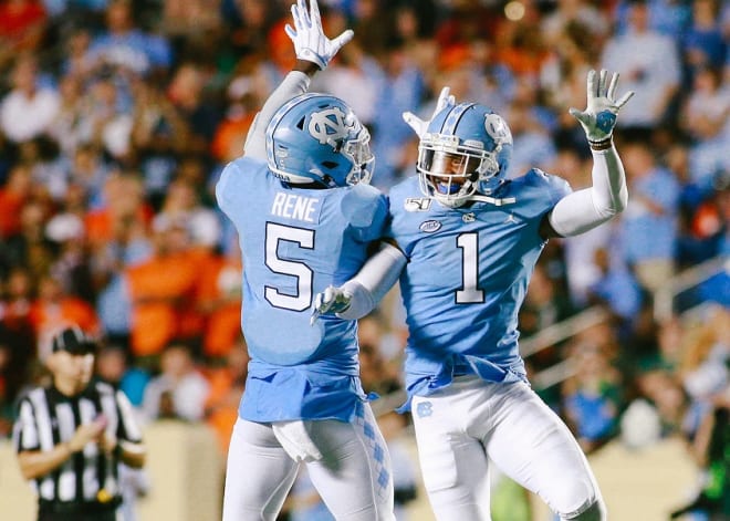 Rene (5) and Myles Dorn (1) celebrating early in the Miami game last September. 