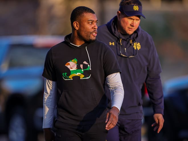 Notre Dame cornerbacks coach Mike Mickens, front, and defensive coordinator Al Golden will make important recruiting visits Friday.
