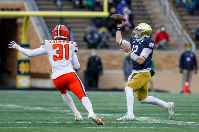 Notre Dame quarterback Ian Book threw for 285 yards and three touchdowns in a 45-21 win over Syracuse. 