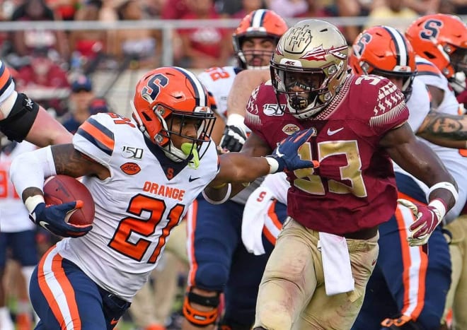 Florida State linebacker Amari Gainer closes in for the tackle against Syracuse's Moe Neal.