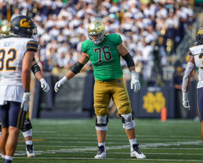 Freshman All-America left tackle Joe Alt (76) was one of 15 freshmen who saw action on offense or defense for the Irish in 2021.