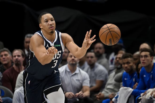 Dec 12, 2023; Dallas, Texas, USA; Dallas Mavericks forward Grant Williams (3) in action during the game between the Dallas Mavericks and the Los Angeles Lakers at the American Airlines Center.