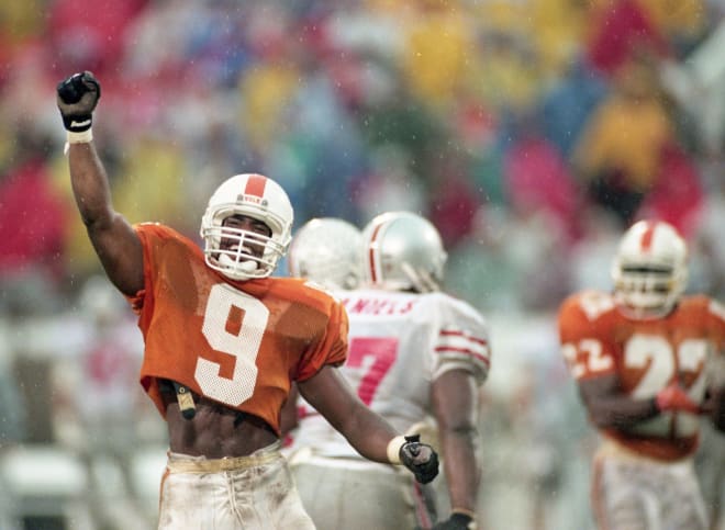 On a day of big plays by Tennessee, Vols defensive back Tori Noel (9) celebrates after recovering an Ohio State fumble in the Citrus Bowl game in Orlando, Fla., Jan. 1, 1996. With both teams tied in the rankings at No. 4 going into the game, Tennessee came out on top 20-14.
