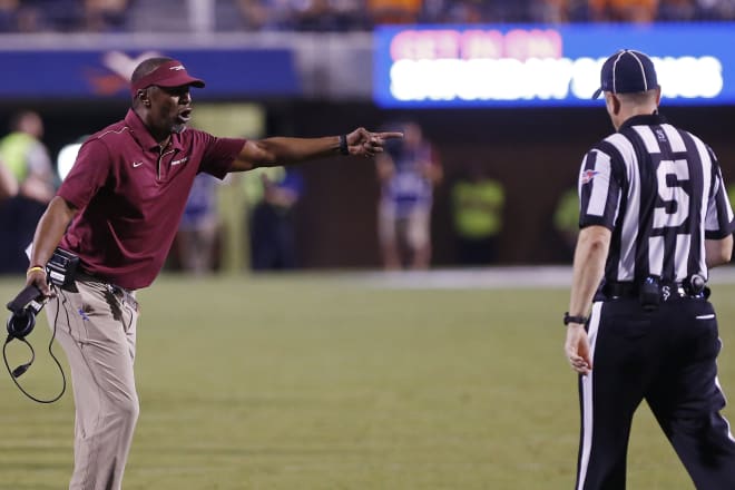 Second-year FSU coach Willie Taggart argues a call Saturday at Virginia.