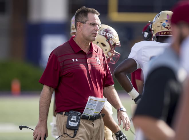 Former Elon coach Curt Cignetti walks the field during the Phoenix's 27-24 win at James Madison this past October.