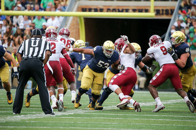 Center Sam Mustipher and the Notre Dame offensive front kept opening enough holes to produce 422 yards rushing.