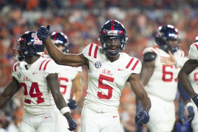 Wide receiver Zakhari Franklin #5 of the Mississippi Rebels celebrates after scoring a touchdown during the first half of their game against the Auburn Tigers at Jordan-Hare Stadium on October 21, 2023 in Auburn, Alabama.