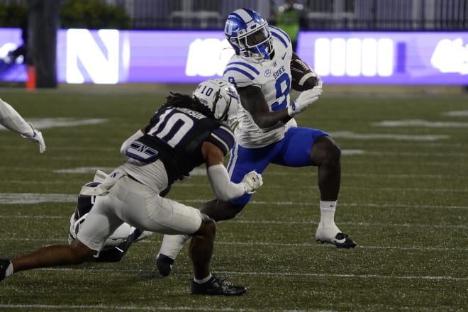 Duke's Jaquez Moore makes a move against Northwestern's Theran Johnson during a game a couple of weeks ago. 