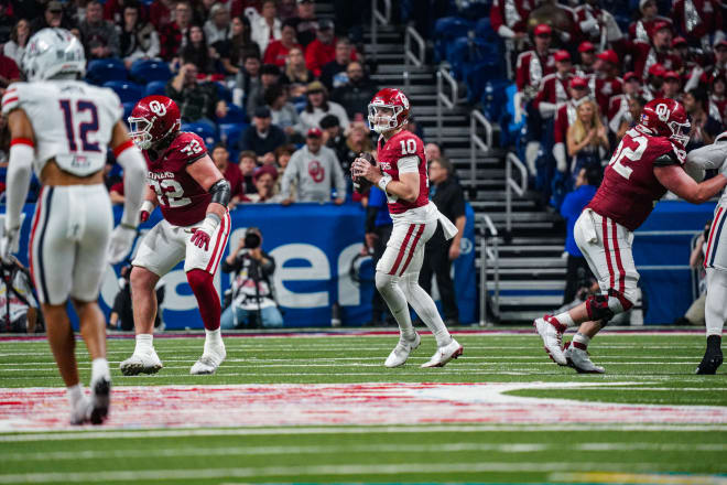 Arnold drops back to pass during his first collegiate start in the Alamo Bowl