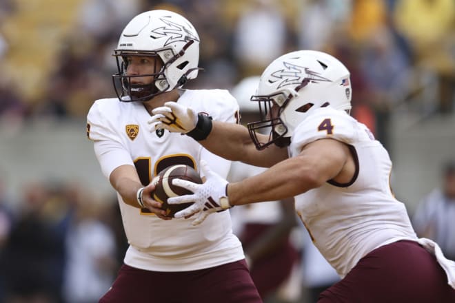 ASU head coach Kenny Dillingham is presented Pat Tillman jersey 