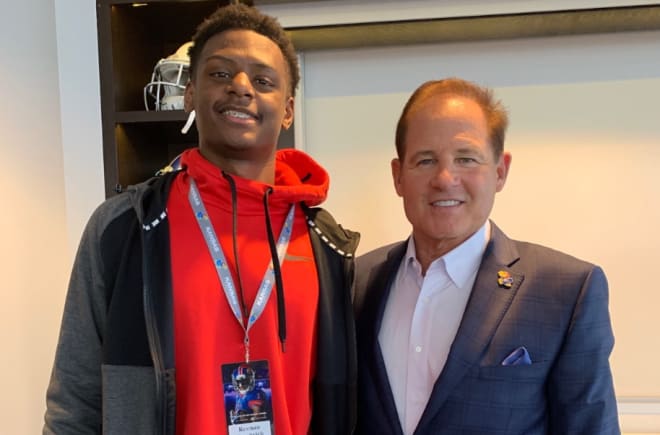Hambrick committed to Kansas during his meeting with Miles
