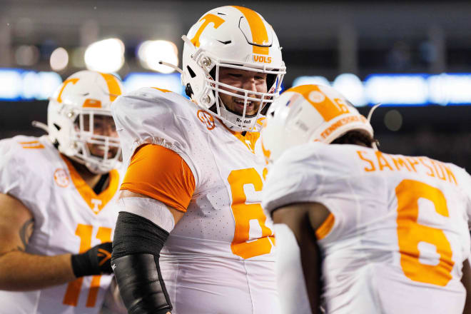 Oct 28, 2023; Lexington, Kentucky, USA; Tennessee Volunteers offensive lineman Cooper Mays (63) celebrates a touchdown with running back Dylan Sampson (6) during the fourth quarter against the Kentucky Wildcats at Kroger Field. Mandatory Credit: Jordan Prather-USA TODAY Sports