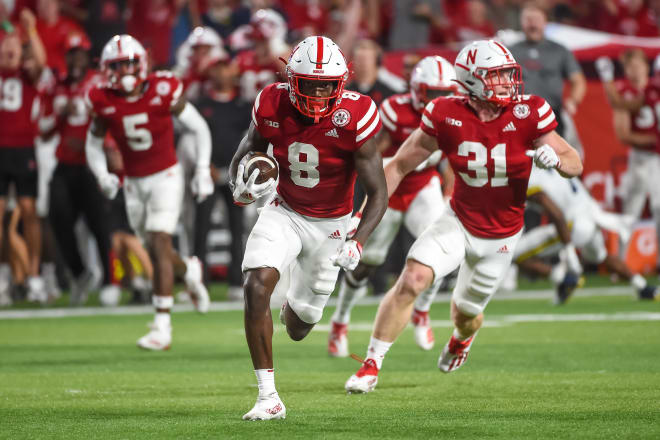 Nebraska safety Deontai Williams running back an interception against Michigan