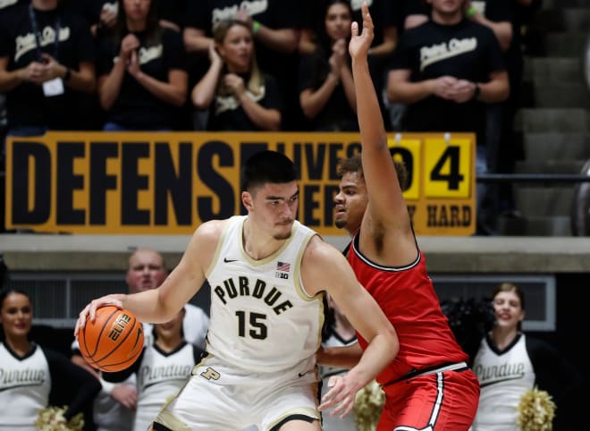 Purdue Boilermakers center Zach Edey (15) is defended by Grace College Elijah Malone (50) during the men s basketball exhibition game, Wednesday, Nov. 1, 2023, at Mackey Arena in West Lafayette, Ind.