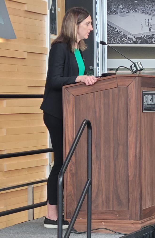 Newly hired MSU women's basketball head coach Robyn Fralick gives her remarks during her introductory press conference in East Lansing, April 4, 2023.