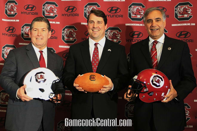Athletics director Ray Tanner, head coach Will Muschamp and President Harris Pastides (left to right) as Muschamp is introduced last December.