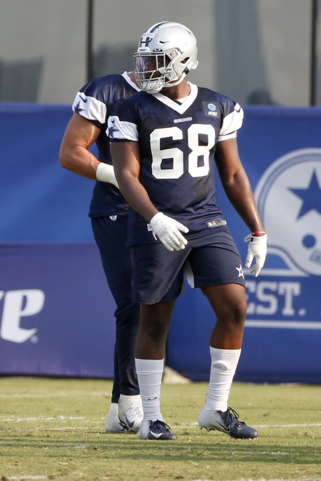 Dallas Cowboys defensive lineman Ron'Dell Carter walks the field during a practice earlier this month in Frisco, Texas.