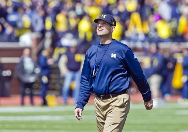 Michigan head coach Jim Harbaugh will check in on top recruits this week. 