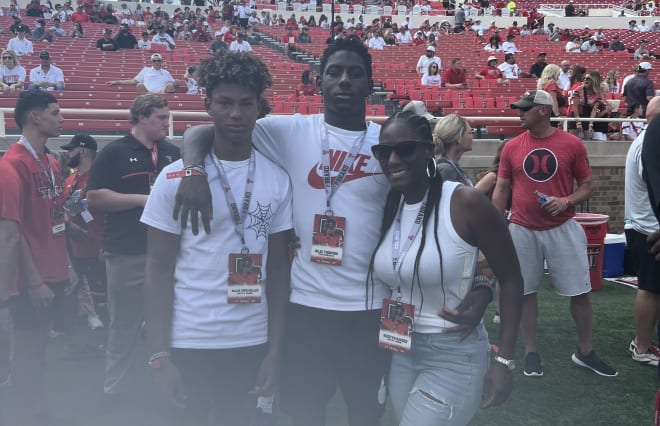Miles Thompson (middle) with his mom and brother at the Texas Tech/Houston game over the weekend