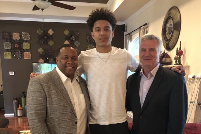 Four-star guard Kevin McCullar hosted Bruce Weber and Chris Lowery on an in-home visit.
