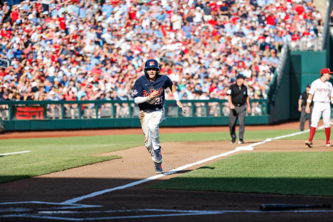Ole Miss Rebels outfielder Kevin Graham (35) runs to home base against the Oklahoma Sooners at Charles Schwab Field. Mandatory Credit: Jaylynn Nash-USA TODAY Sports