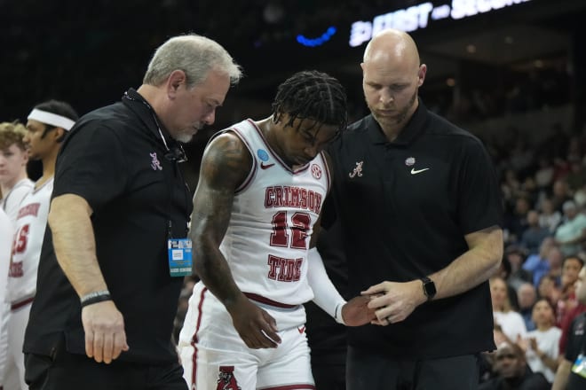 Alabama Crimson Tide guard Latrell Wrightsell Jr. (12) is attended to by official in the first half against the Grand Canyon Antelopes at Spokane Veterans Memorial Arena. | Photo: Kirby Lee-USA TODAY Sports