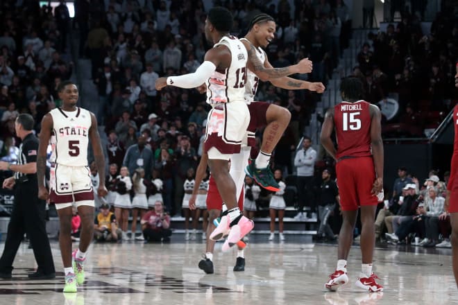 Mississippi State Bulldogs guard Josh Hubbard (13) celebrates with guard Shakeel Moore (3) after a three point basket against the Arkansas Razorbacks during the second half at Humphrey Coliseum. Mandatory Credit: Petre Thomas-USA TODAY Sports