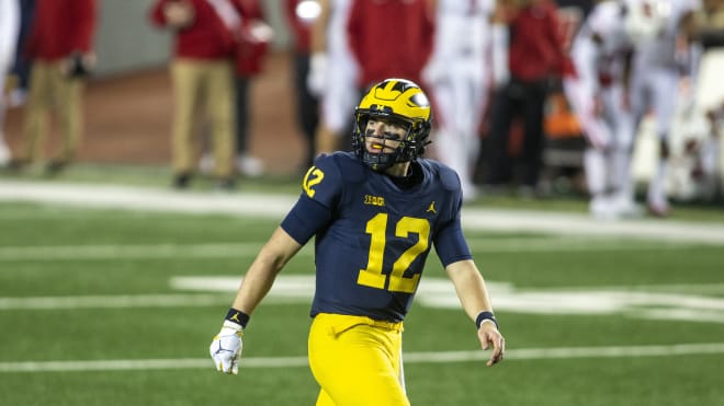 Michigan Wolverines football redshirt freshman quarterback Cade McNamara threw his first touchdown pass of his career against Wisconsin last year.