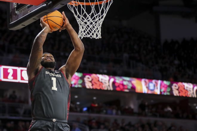 John Hugley dunking the ball