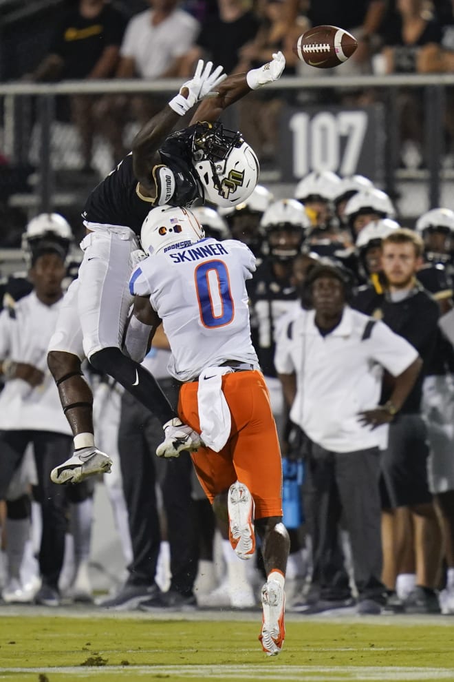 Boise State safety JL Skinner (0) breaks up a pass intended for Central Florida wide receiver Ryan O'Keefe during the first half of an NCAA college football game Thursday, Sept. 2, 2021, in Orlando, Fla. (AP Photo/John Raoux)