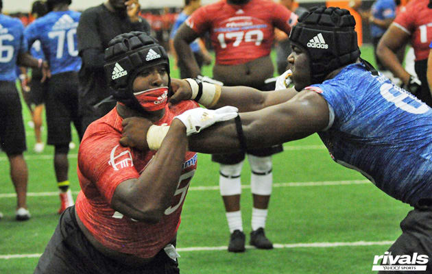 Joshua Landry (left) in offensive line vs. defensive line one-on-one matchups at the Dallas Rivals Three Stripe Camp in April