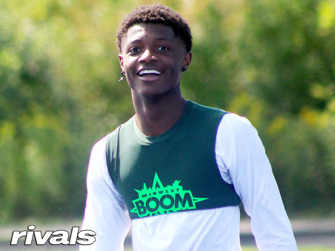 Rivals100 wide receiver Carnell Tate holds a Michigan Wolverines football recruiting offer. 