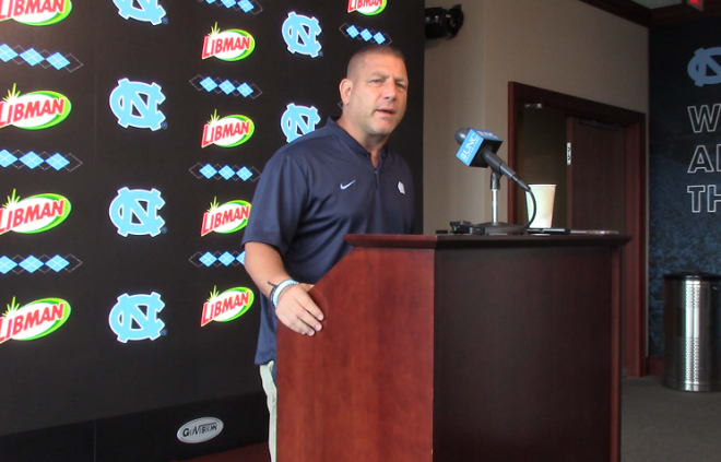 UNC OC Phil Longo (pictured) and DC Jay Bateman discussed their units Monday at the Kenan Football Center.