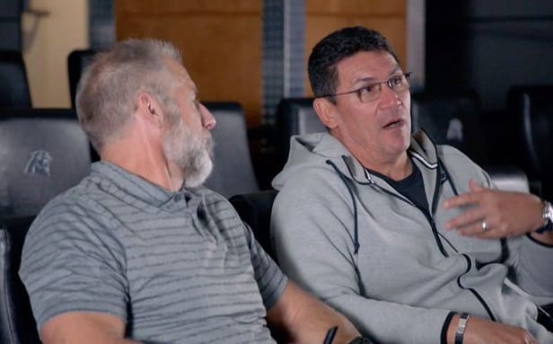Donnalley (left) with former Panthers coach Ron Rivera. 