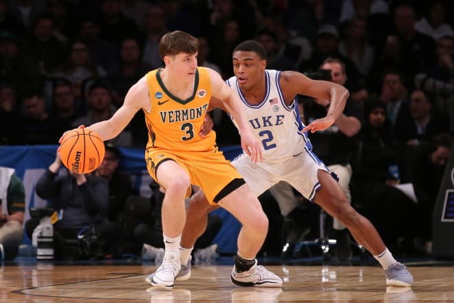 Duke's Jaylen Blakes, right, defends Vermont's TJ Hurley on Friday night. 