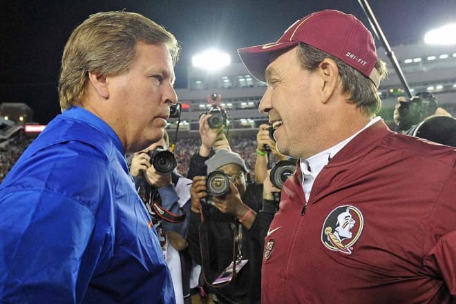 Florida coach Jim McElwain speaks with Florida State coach Jimbo Fisher after the Seminoles' 31-13 win over the Gators in late November.