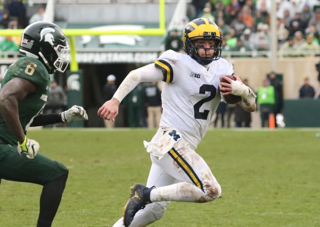 Michigan Wolverines football senior quarterback Shea Patterson threw two touchdown passes against MSU last year.